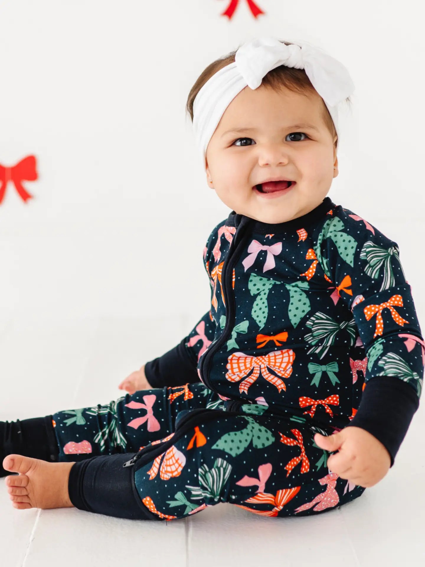 Navy Bows Zip Up Footie